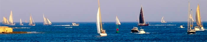 Sight of sailboats sailing classic contest held during the year 2007, the boats compete in front of the bolla marking the entrance of the port of Mahon